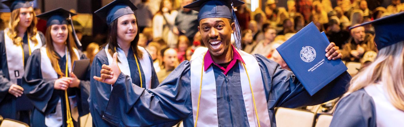 DSU Graduation Smiling Graduate